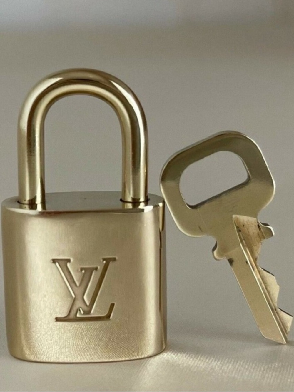 #309 LV Gold-tone Lock and Key Set